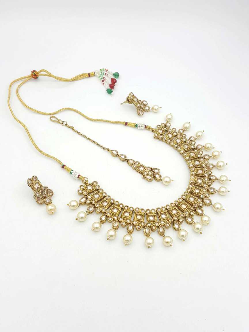 NECKLACE SET WITH MAANG TIKA in CHECKERED POLKI Style | Design - 18611